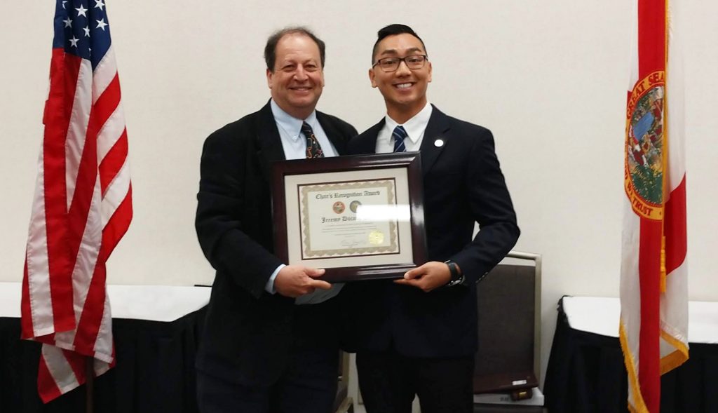 Jeremy Tran with award