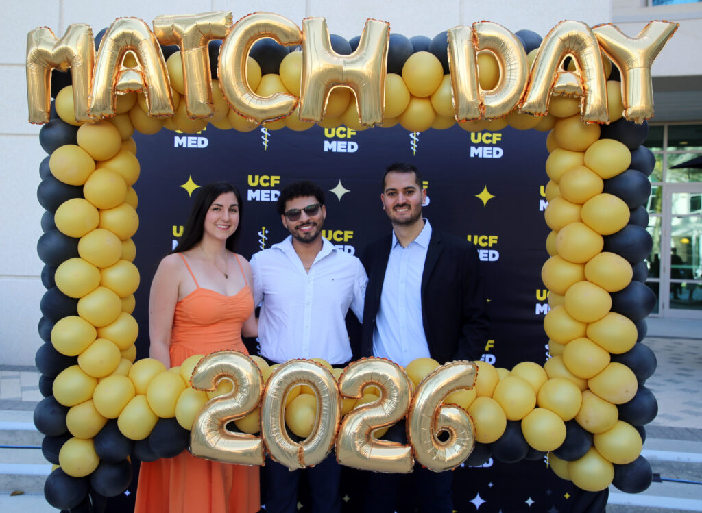 Elizabeth Durkin, Anthony Martinez and Rodolfo Rodriguez pose together at Match Day 2026. 