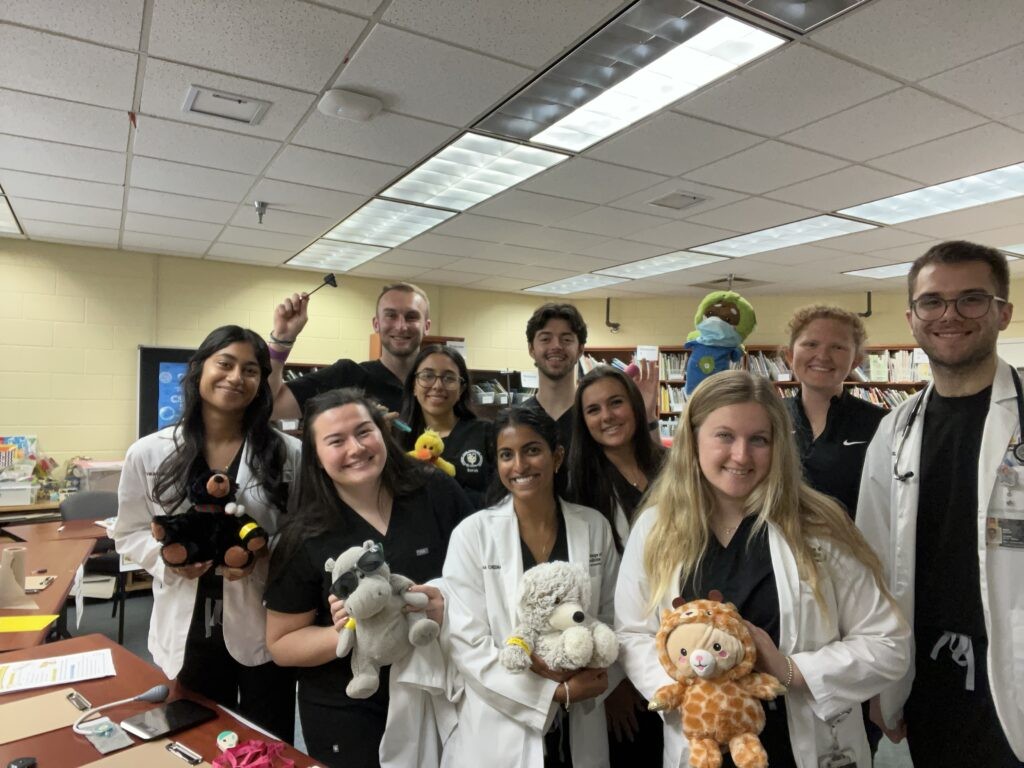 PCP Scholars lead a Scholarly Project Teddy Bear Clinic teaching children hygiene practices in February 2026.