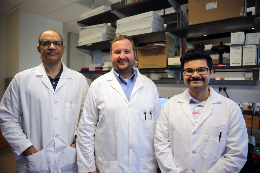 A photo of the researcher and two research assistants.