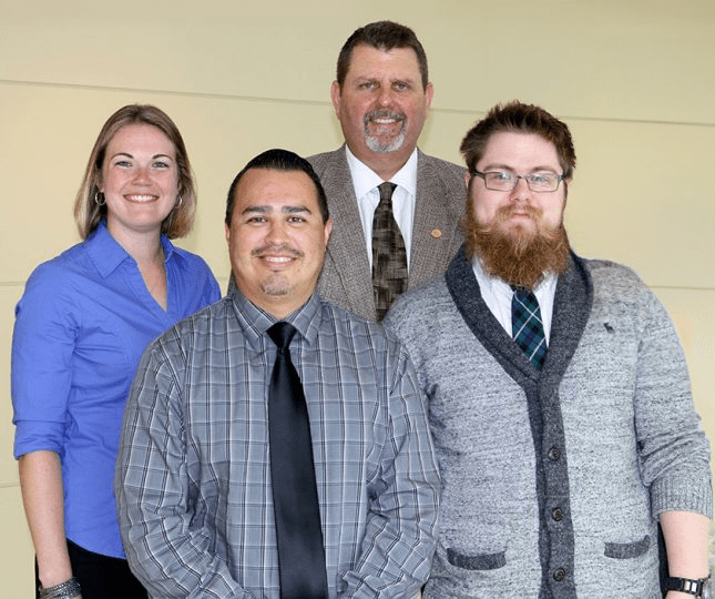 COM Educational Technology Team. From left to right, Melissa Cowan, Dale Voorhees, Alex Chacon, and Ryan Dickerson.