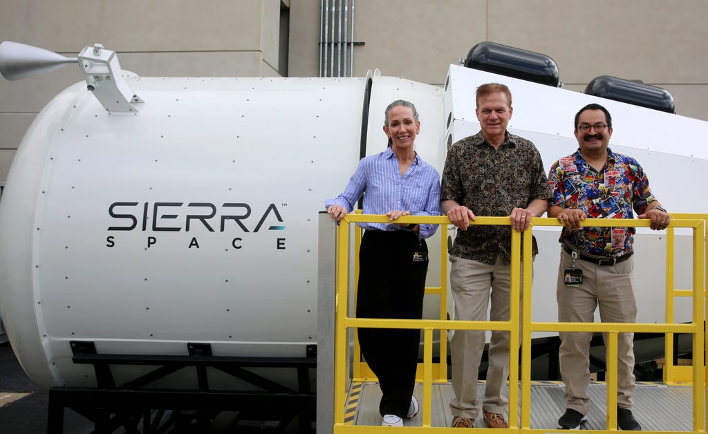 (From left to right) College of Medicine faculty Jennifer Fogarty, William (Ed) Powers and Emmanuel Urquieta will lead advancements in aerospace medicine thanks to Sierra Space’s donation of its cargo capsule.